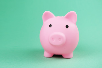 Close up of a rubber duck on the pink background..