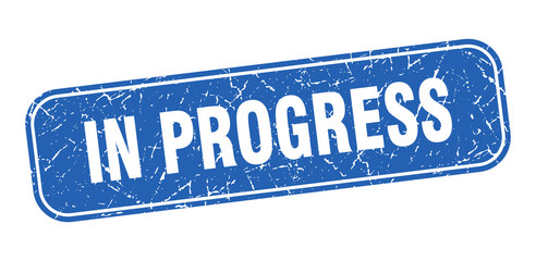 in progress stamp. in progress square grungy blue sign.