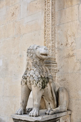 The stone statue of a lion at Cathedral of St. James in Sibenik, Croatia.