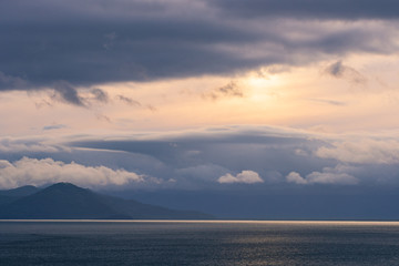 Scenic high rocks in the Pacific Ocean. Kamchatka Peninsula.