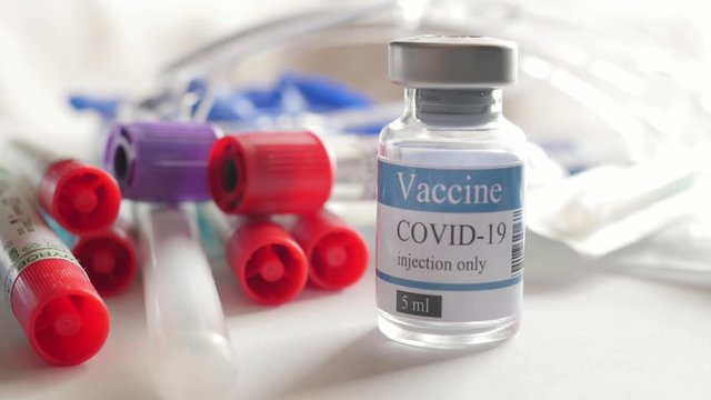 doktor putting vial, covid-19, coronavirus vaccine ampoule, injection