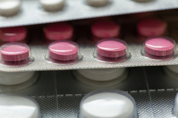 Different pills in blister packs. Medical preparations. Stack of different pills. Medical...