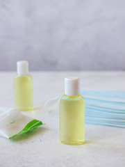 disinfecting gel, protective medical masks and antibacterial wipes. safe medical means of protection against viruses and diseases. horizontal image, place for text