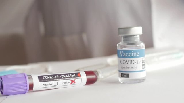 doktor putting vial, covid-19, coronavirus vaccine ampoule, injection