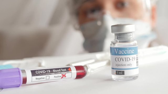 doktor putting vial, covid-19, coronavirus vaccine ampoule, injection