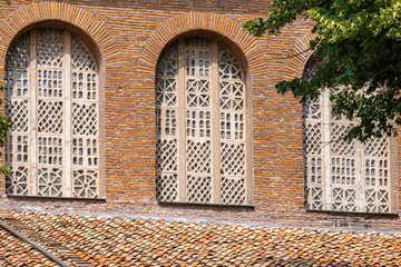 old bricks church with beautiful windows