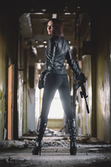 Fototapeta na wymiar Concept of special agent girl with airsoft rifle.