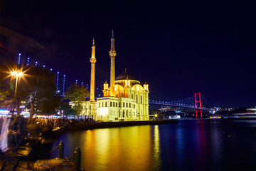Ortakoy Mosque and Bosphorus Bridge (15th July Martyrs Bridge) night view. Istanbul, Turkey