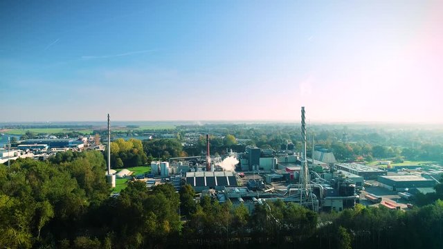 Factory with Pipes and Steam near Burgum - Friesland, Netherlands / Holland &ndash; 4K Drone Footage