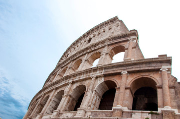 Obraz premium 2020 coronavirus pandemic in Italy. Coliseum. Empty historical architecture of Colosseum. The tourist area is quarantined. worldwide pandemic of coronavirus disease. Italy, Pandemic New Epicenter