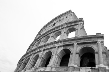 Coliseum is an amphiteatre. Dangerous infection of coronavirus covid-2019. Colosseum or Coliseum. Ancient roman coliseum. Destination place and location. trip to italy. black and white. I love Italy