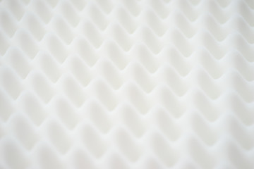 White gradient abstract background with many waves at different angles.