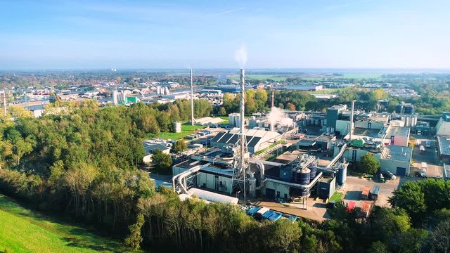 Factory with Pipes and Steam near Burgum - Friesland, Netherlands / Holland &ndash; 4K Drone Footage