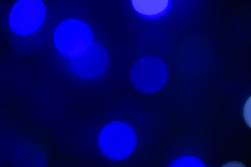 Abstract bokeh cold colors and black background