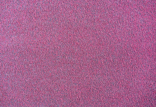 Background of pink carpet or foot scraper