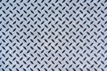 Background of old metal diamond plate in gray color