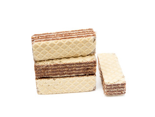 Crispy wafers with creamy hazelnut filling isolated on white background