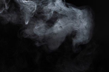 White steam on a black background.