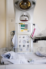 Closeup of Infant Incubator Technology in a Medical Center Hospital. Unidentified New Born Babies in Maternity Hospital. Newborn and Childbearing Center Room in Modern Hospital. Newborn in INCU Room. 