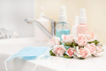 A set of hygienic antiseptics in a sanitary room. Antibacterial protection and self-care. Stop the spread of infection.