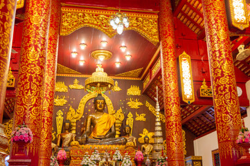 Fototapeta na wymiar The Phra Jao Lan Thong Buddha statue.was built in B.E. 2039 (524 years ago) of Marichai Material, Enriched with gilding Lap size, 3 cubits wide, 2 creep, Lanna art period Lampang .