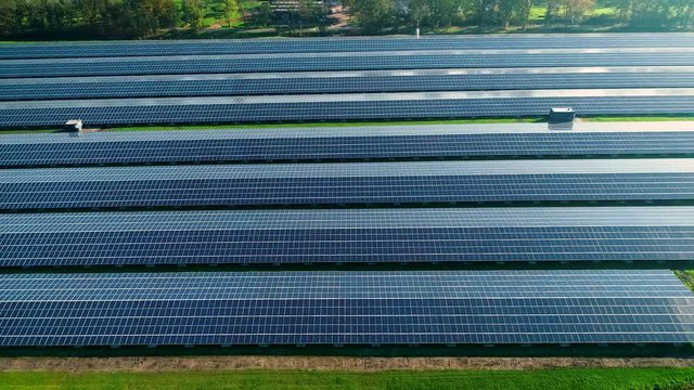 Solar Plant: Rows of Solar Panels Producing Sustainable Energy - Friesland, Netherlands / Holland &ndash; 4K Drone Footage