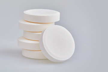 Multivitamin effervescent tablet pills. Vitamin C soluble pills. Fizzy Vitamin C for Drink, 500mg