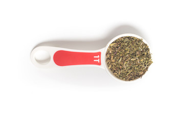 Dried Oregano into a Tablespoon.