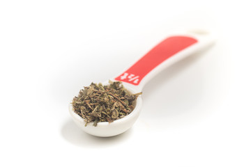 Dried Oregano into a Teaspoon