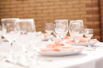 empty wine glasses restaurant interior serving, beautifully served wine glasses