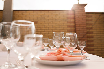 empty wine glasses restaurant interior serving, beautifully served wine glasses