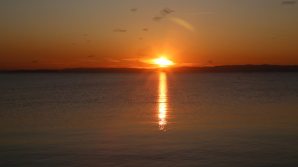 Naklejka na ściany i meble Sunset at the Garda lake - Italy