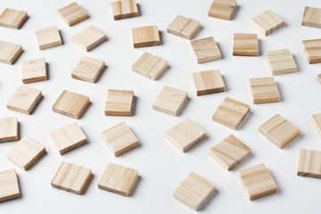 Empty wooden blocks pattern on the white background, top view
