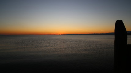 Fototapeta premium Sunset at the Garda lake - Italy