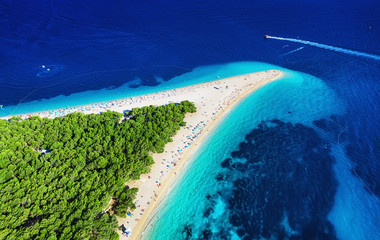 Croatia, Hvar island, Bol. Panoramic aerial view at the Zlatni Rat. Beach and sea from air. Famous...
