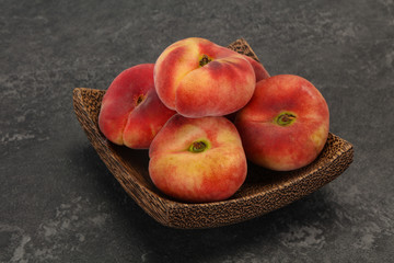Sweet ripe tasty flat peach