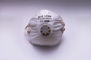 Respiratory protection mask on white background Pandemics, epidemics