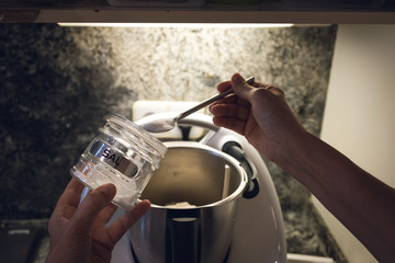 Hands making bread doe. A POV shot