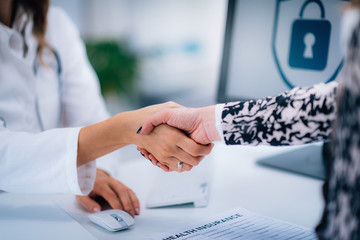 Handshake After Signing Medical Data Form