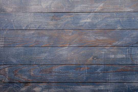  Vintage blue wood background texture with knots and nail holes. Old painted wood wall. Blue abstract background. Vintage wooden dark blue horizontal boards. Front view with copy space. Background for