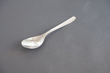 Kitchen utensils on a dark background on the table