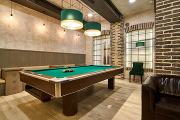 Billiard hall with a big pool table 