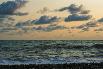 Obraz premium Amazing sea sunset, the sun, waves, clouds