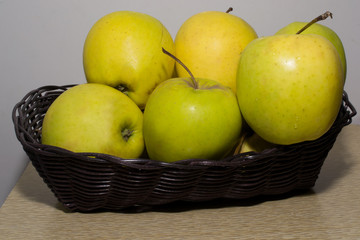 green apples in a basket
