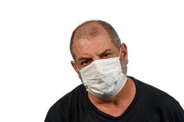 Portrait of a man, in a medical mask. A concept of the danger of COVID-19 coronavirus for the elderly. on white background with space for text