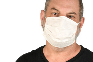 Portrait of a man, in a medical mask using alcohol gel. A concept of the danger of COVID-19 coronavirus for the elderly. on white background with space for text