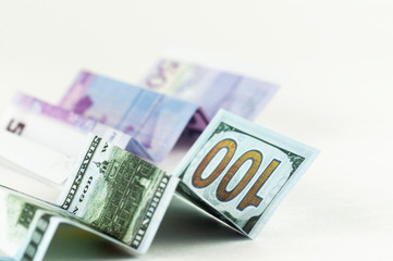 dollar and Euro notes in the form of a growth chart