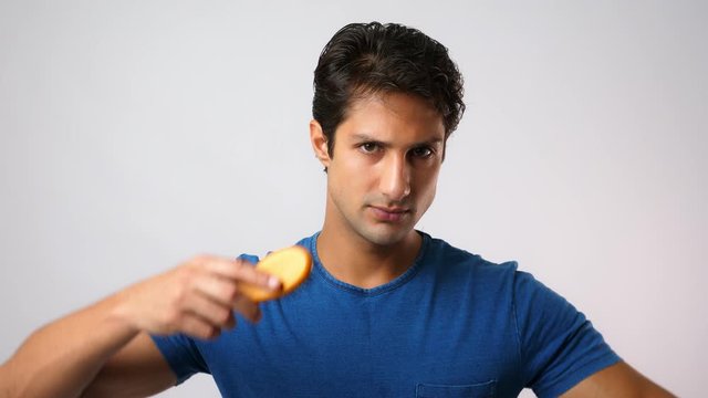 Handsome young man look at mirror for checking handsome face and hairdo. Attractive handsome guy comb hair by use hairbrush. He look confidence and proud himself. Charming men look after himself well 