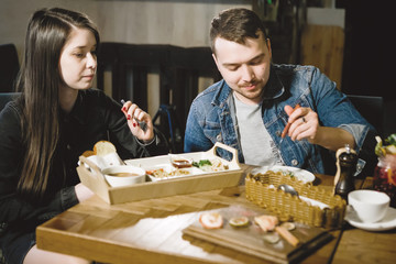 Fototapeta premium Man and a woman in a restaurant.