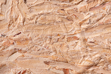 Texture of pressed sawdust close up. Pressed sawdust background.